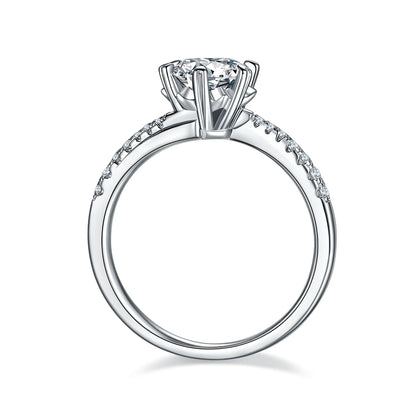 Round moissanite six-prong twisted band ring in silver, 1 carat center stone.