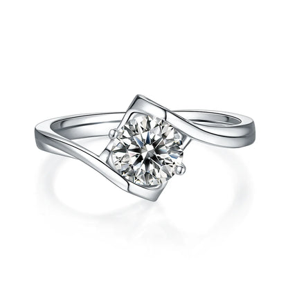 Angel wing twist moissanite ring, 1 carat center stone, sterling silver with white gold plating.