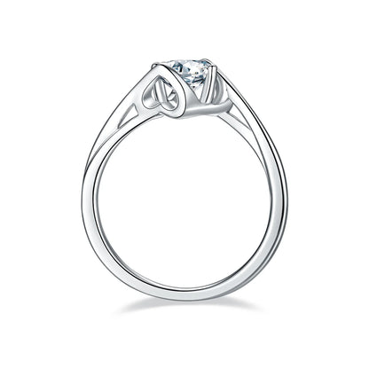 Angel wing twist moissanite ring, 1 carat center stone, sterling silver with white gold plating.