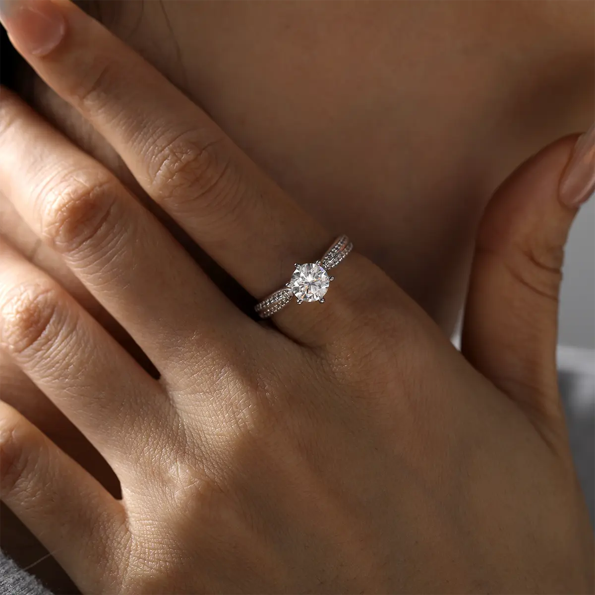 Round moissanite double pave ring, 1 carat center stone, sterling silver with white gold plating.