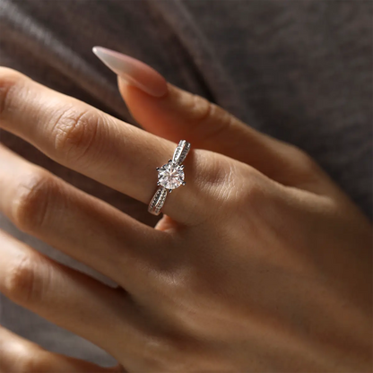 Round moissanite double pave ring, 1 carat center stone, sterling silver with white gold plating.