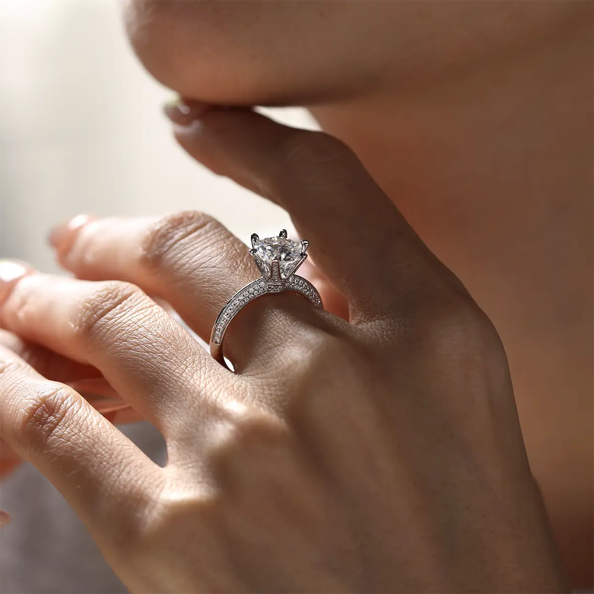 2ct round moissanite pave ring, sterling silver with white gold plating, elegant double-row design.