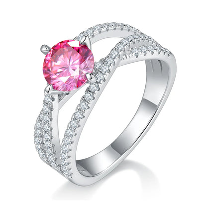 silver moissanite ring with 1ct round center stone and double-row crossover pavé band