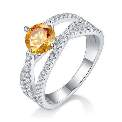 silver moissanite ring with 1ct round center stone and double-row crossover pavé band