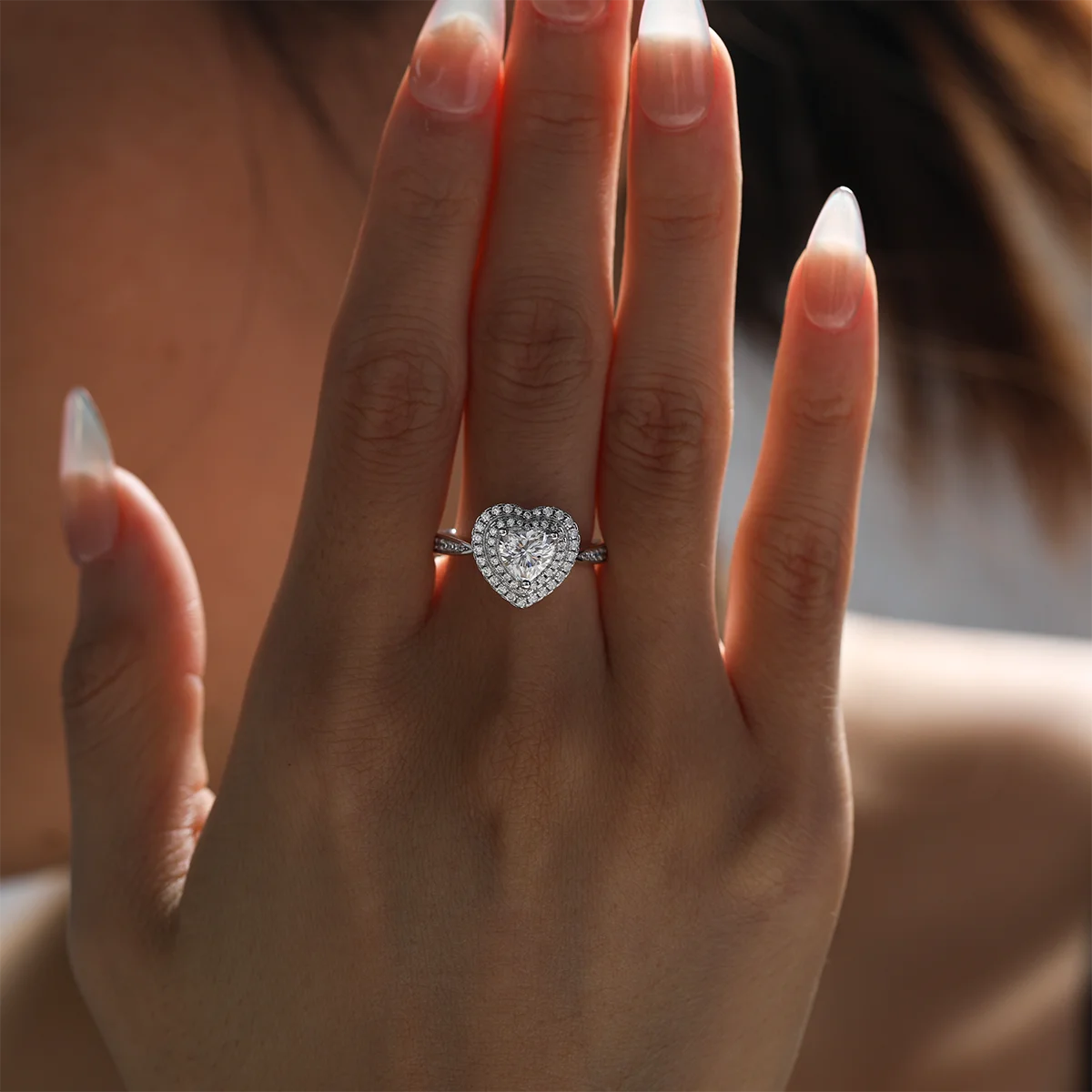 luxury heart-shaped moissanite ring with 1ct center stone and triple pavé halo design