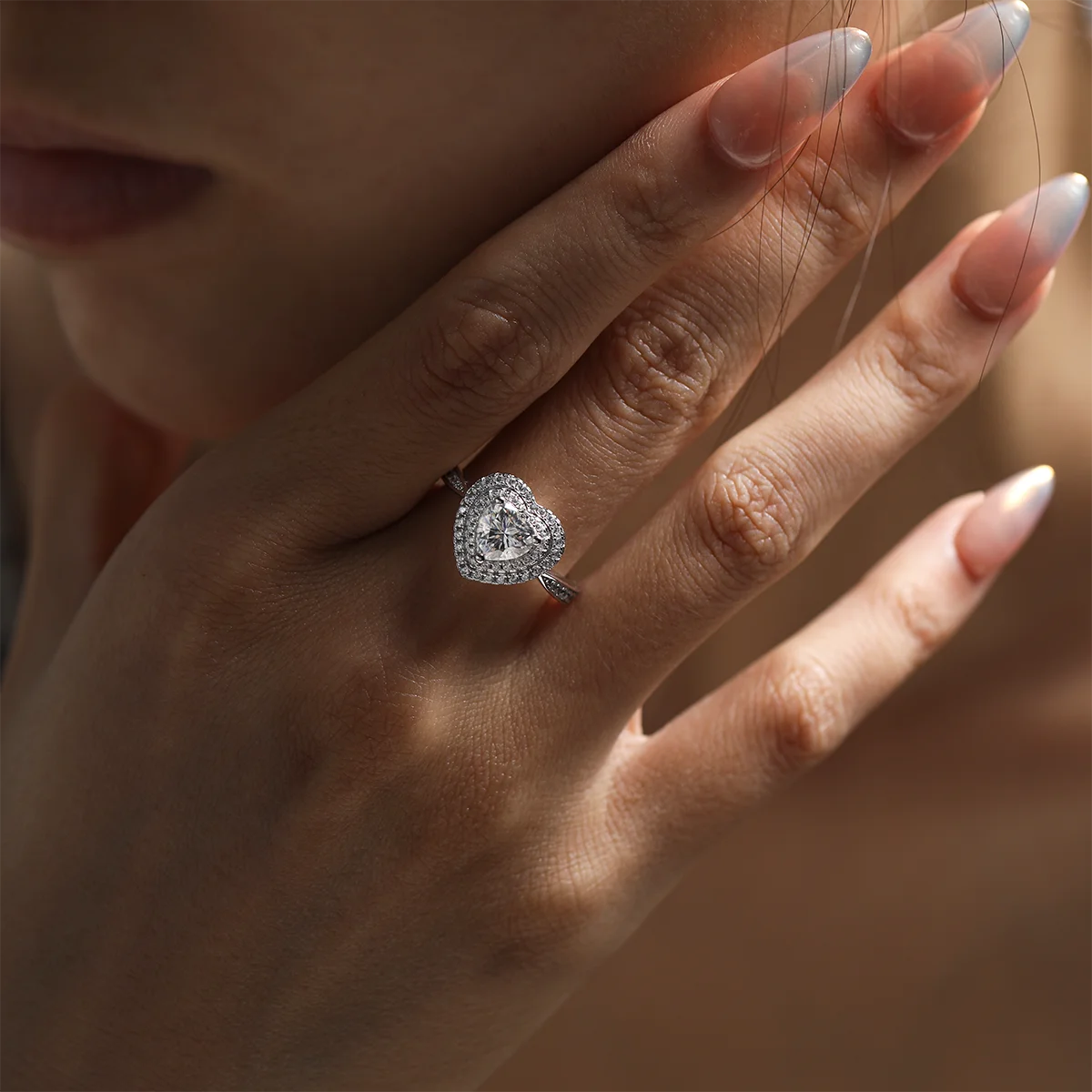 luxury heart-shaped moissanite ring with 1ct center stone and triple pavé halo design