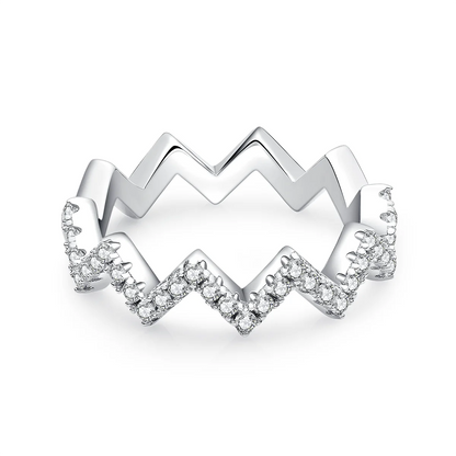 0.7ct Moissanite Geometric Band Ring in 925 Sterling Silver with 18K White Gold Plating, featuring modern folded-line design and sparkling moissanites.