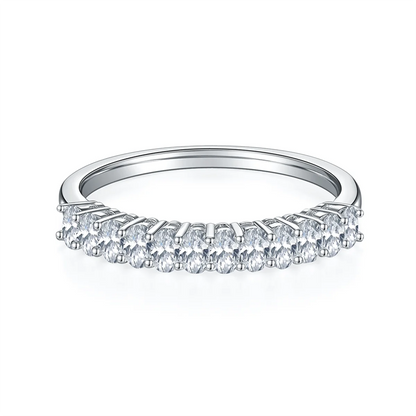1.0ct Oval Moissanite Half Eternity Ring in 925 Sterling Silver with 18K White Gold Plating, featuring twelve oval-cut moissanites for timeless elegance.