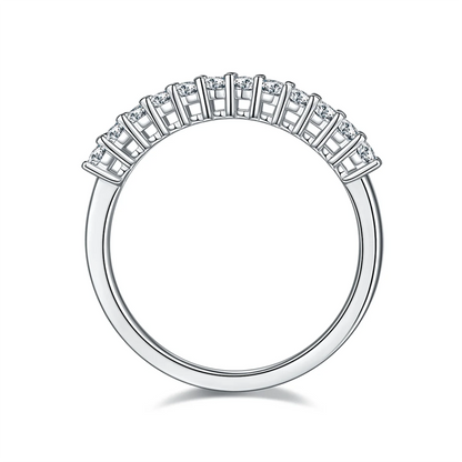 1.0ct Oval Moissanite Half Eternity Ring in 925 Sterling Silver with 18K White Gold Plating, featuring twelve oval-cut moissanites for timeless elegance.