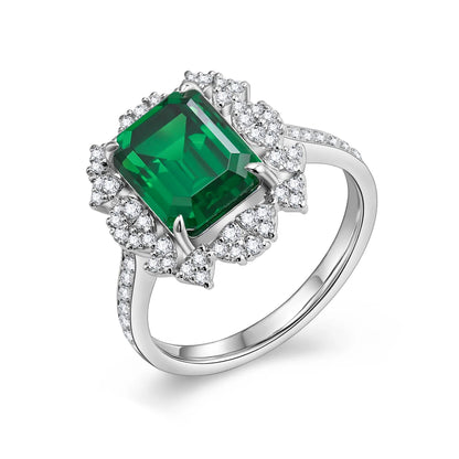 A 5.5ct emerald-cut green YAG gemstone set in white-gold-plated sterling silver, accented by white cubic zirconia that resemble delicate blooming petals.