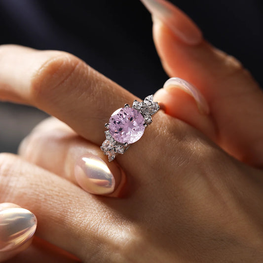 Light pink Padparadscha sapphire floral ring in sterling silver, 4.7ct center stone with white accents.