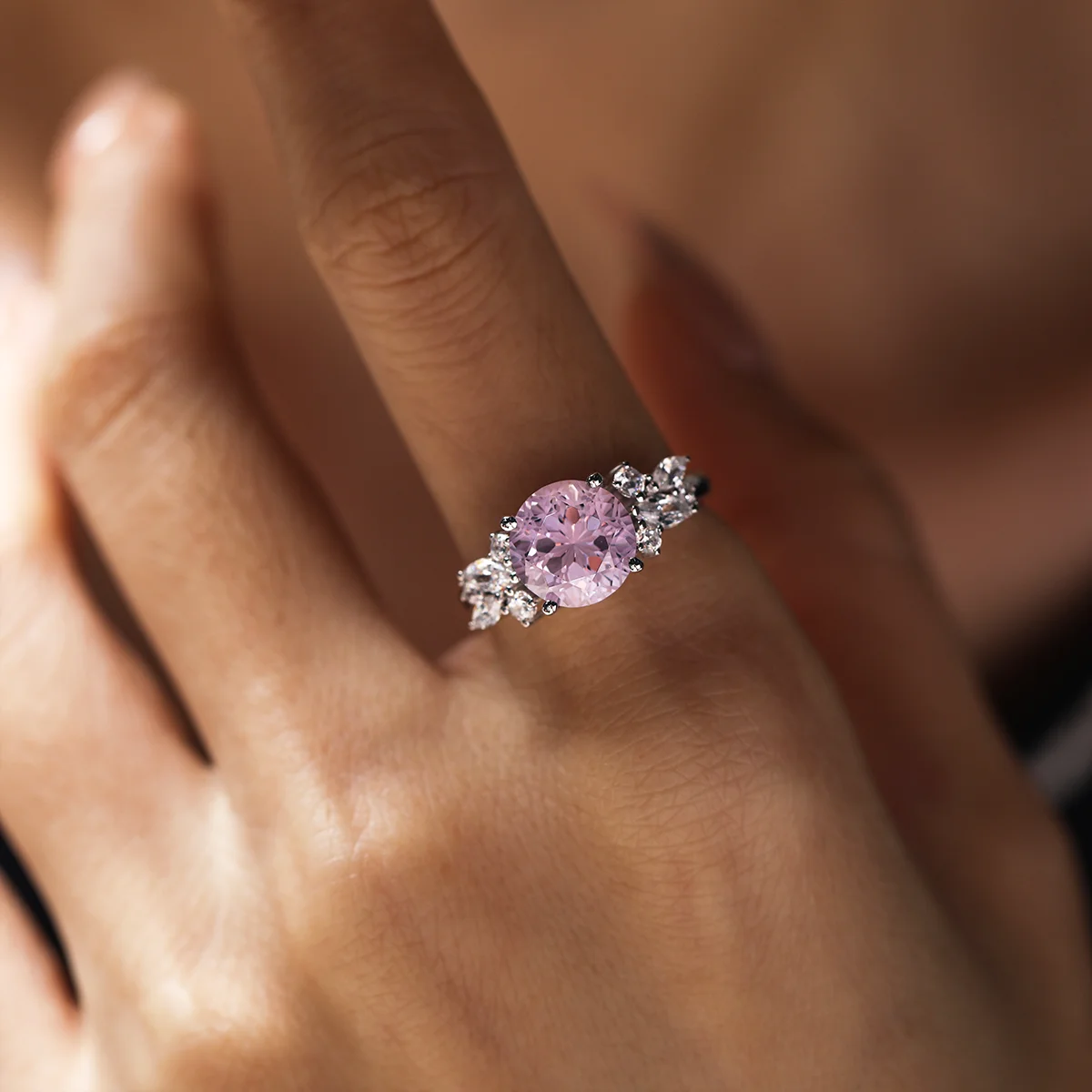 Light pink Padparadscha sapphire floral ring in sterling silver, 4.7ct center stone with white accents.