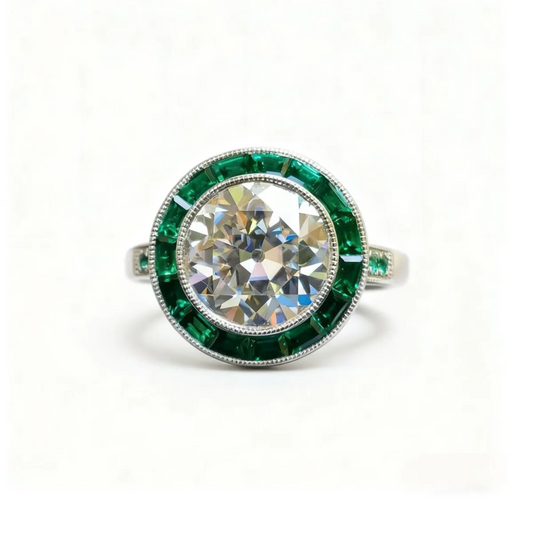 Art Deco–inspired 14K white gold ring with 2.5ct round lab diamond and emerald-cut side stones