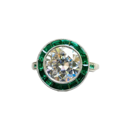 Art Deco–inspired 14K white gold ring with 2.5ct round lab diamond and emerald-cut side stones