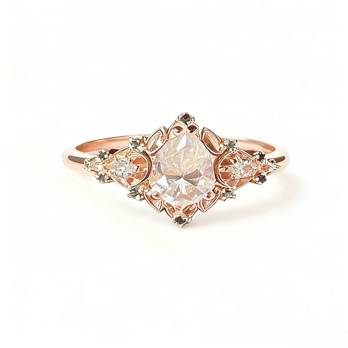 Victorian style rose gold cluster ring with pear cut center diamond and pear accents