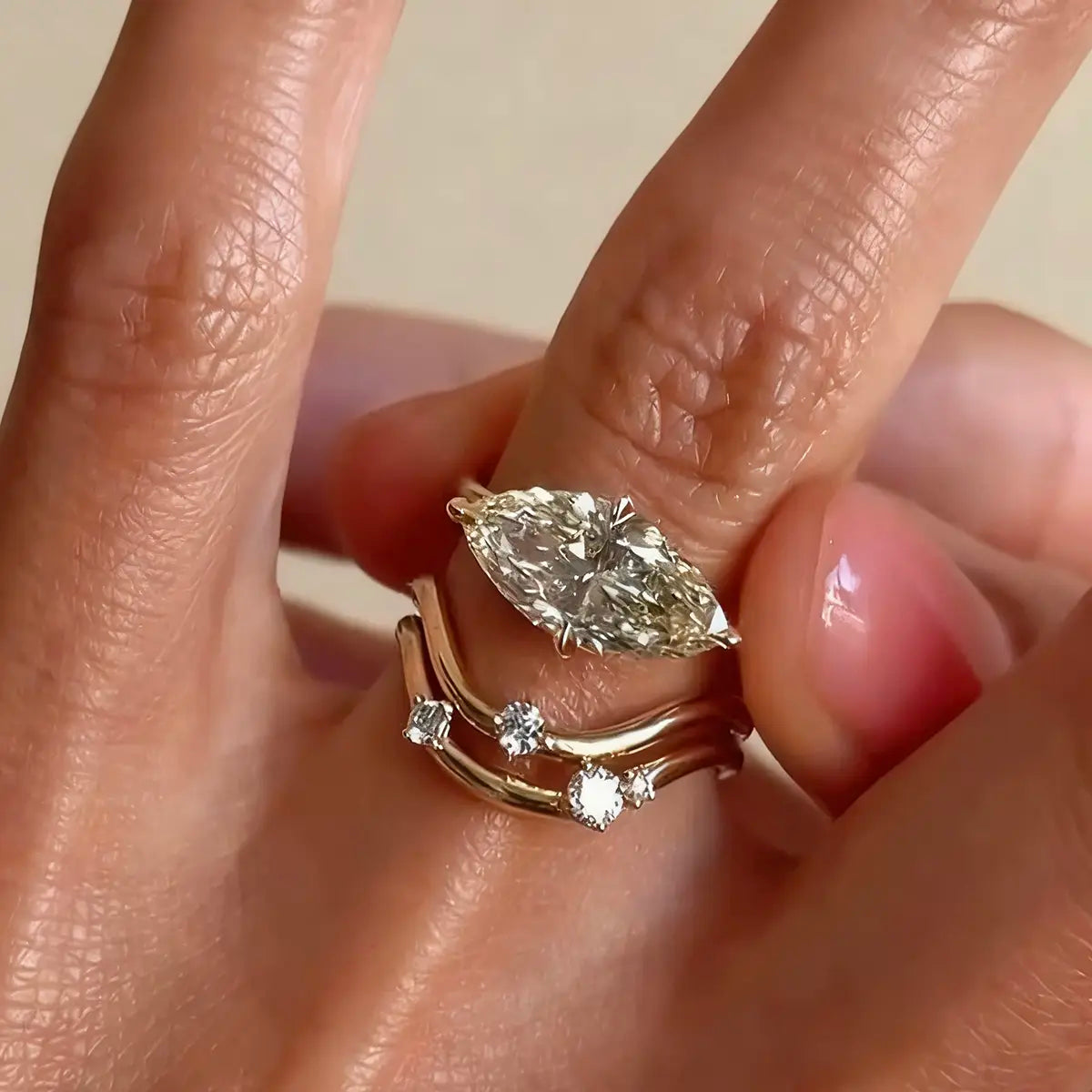 Double-layer wave ring with 2.0ct marquise lab diamond in yellow gold