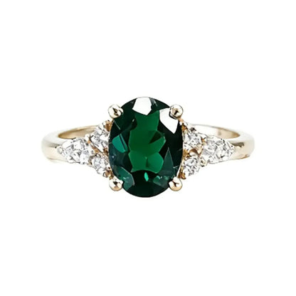 14K yellow gold ring with a 1.6ct oval-cut deep green lab-grown diamond and a slim classic band