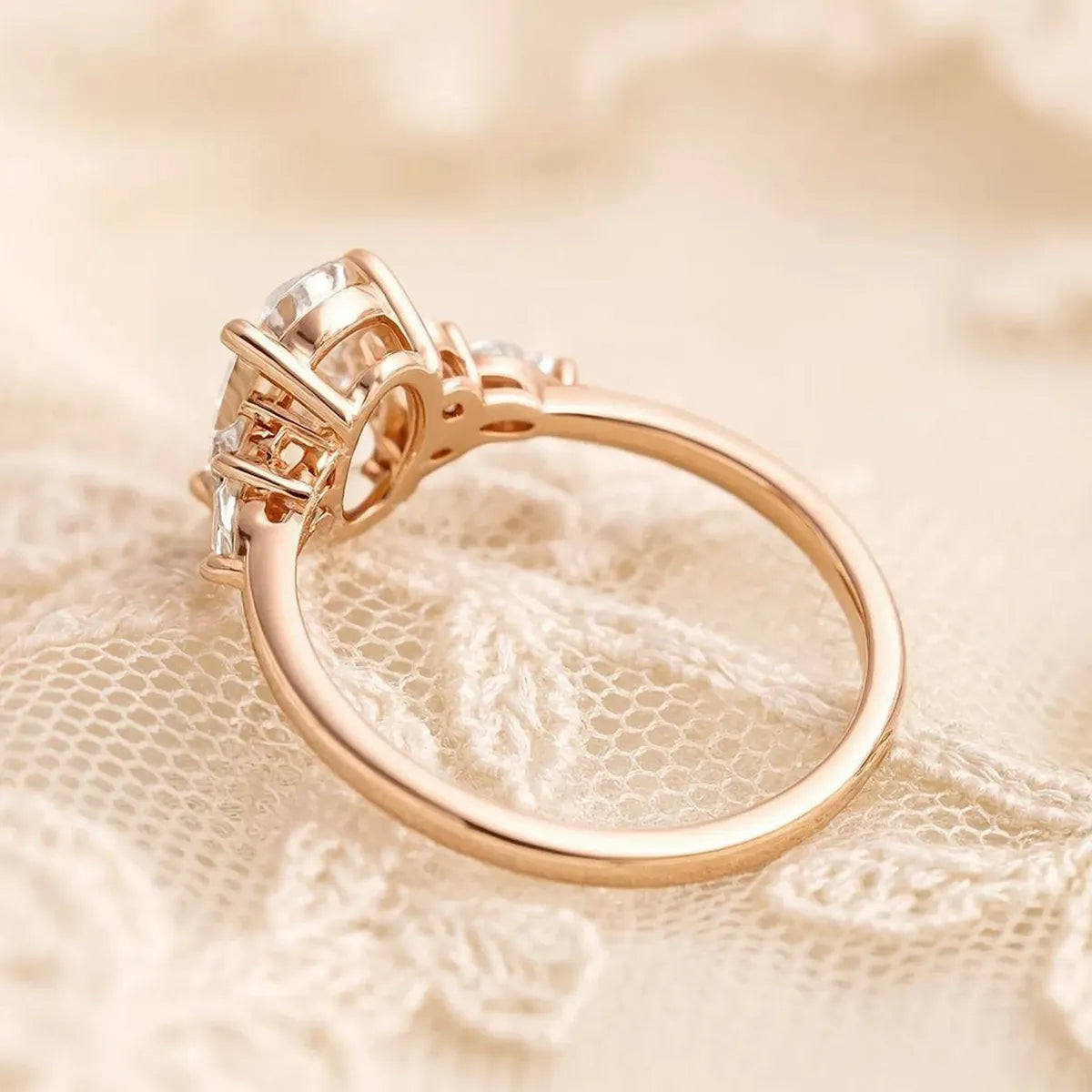 1.2ct oval lab-grown diamond ring with side stones in rose gold