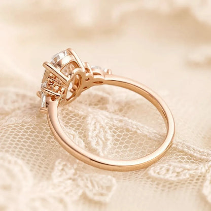 1.2ct oval lab-grown diamond ring with side stones in rose gold