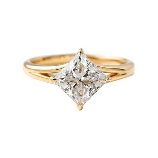classic princess cut moissanite solitaire ring in 14k gold with four prong setting