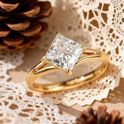 classic princess cut moissanite solitaire ring in 14k gold with four prong setting