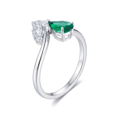 14K white gold V-bypass ring with pear-cut lab-grown green diamond and round white diamond accents