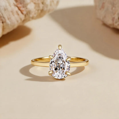 Elongated pear cut solitaire engagement ring with lab-grown diamond