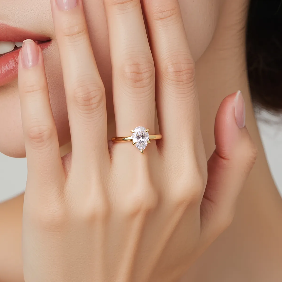 Elongated pear cut solitaire engagement ring with lab-grown diamond