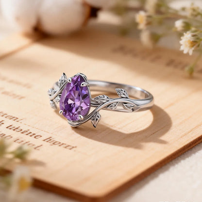 Vine wrap pear cut lab-grown purple diamond statement ring with leaf details