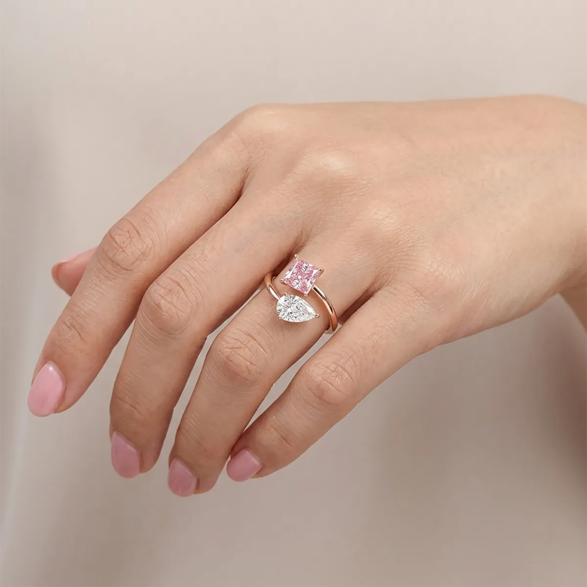princess cut pink and pear cut white lab grown diamond toi et moi bypass ring with open two stone design